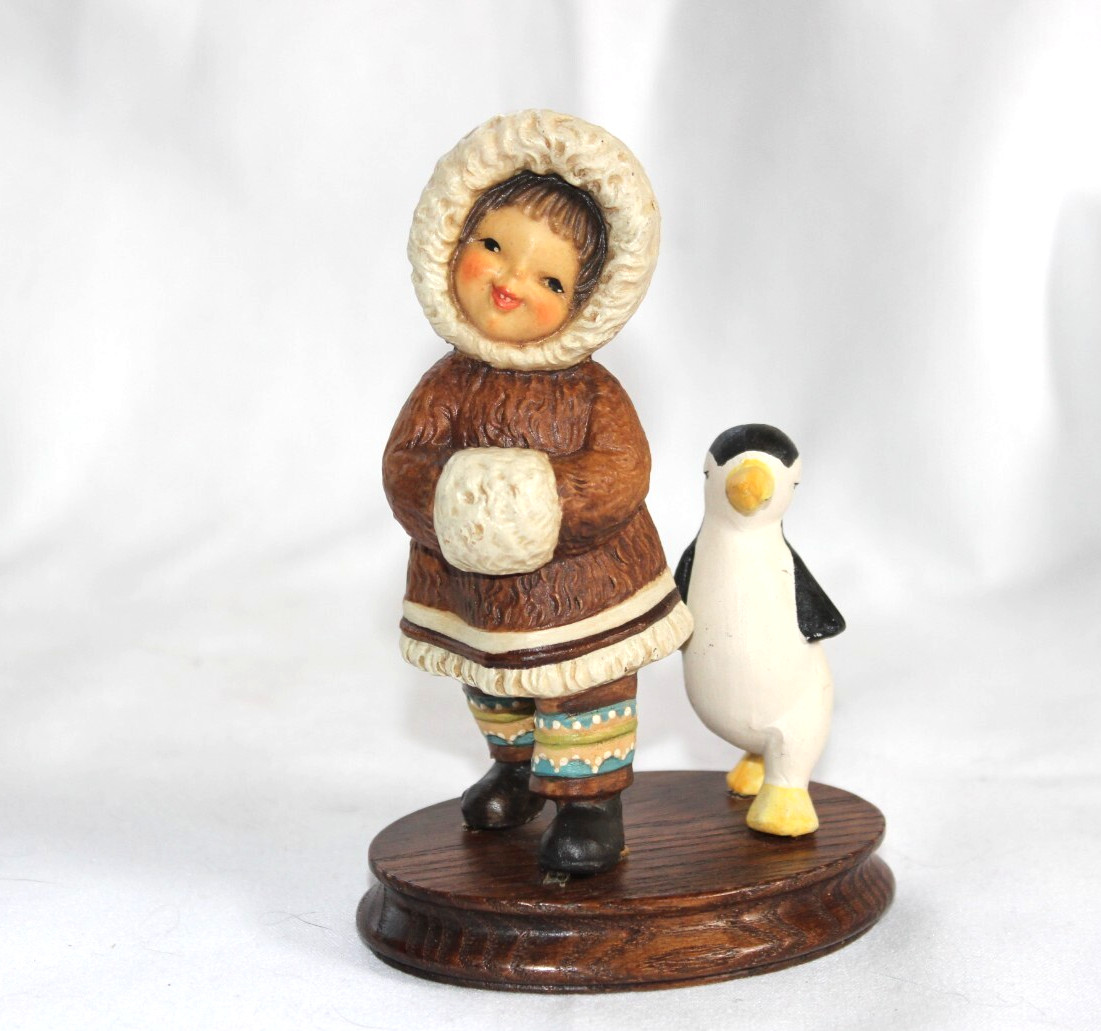 Vintage ANRI Eskimo and Penguin Figurine Italy wood base Vintage ANRI Eskimo and Penguin Figurine Italy wood base