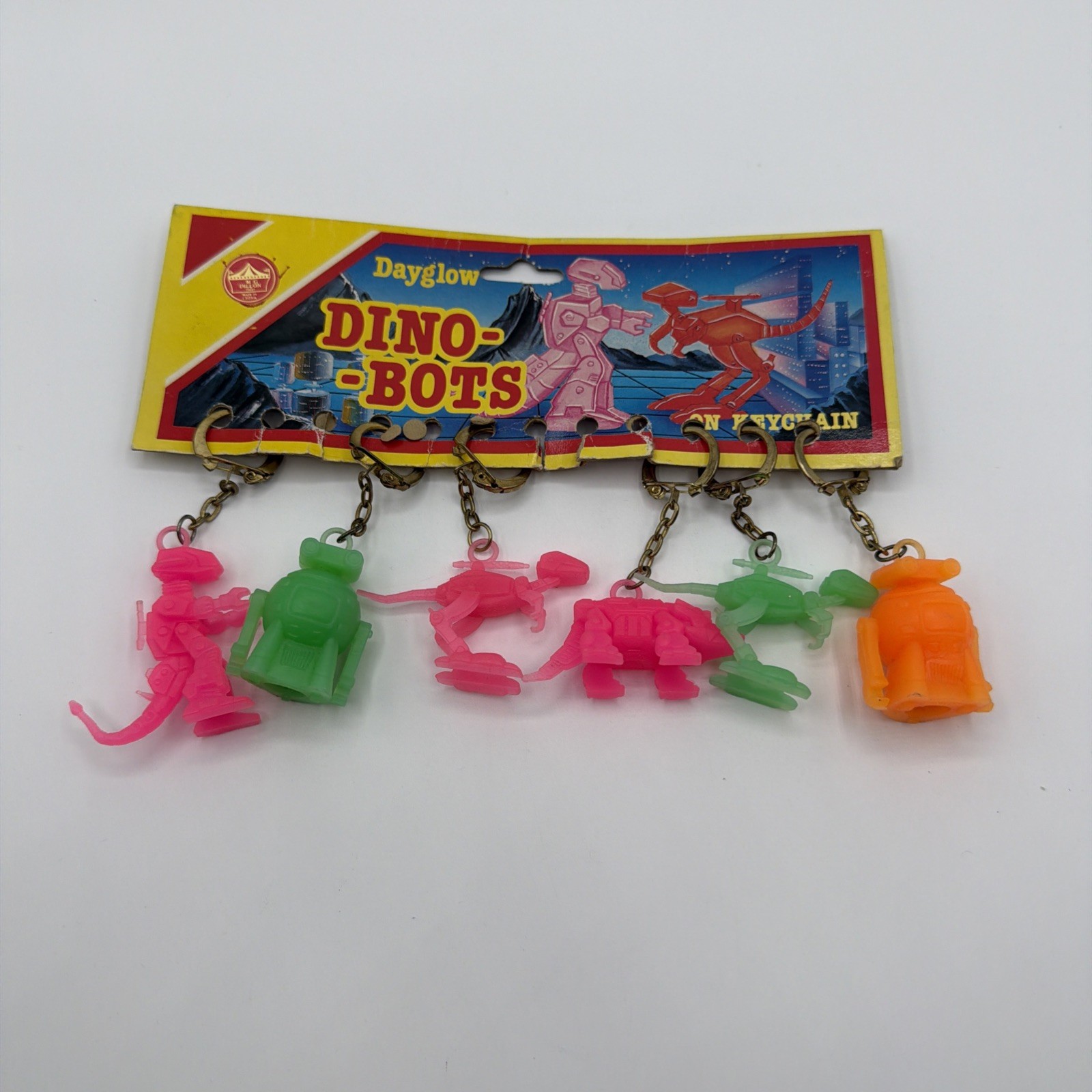 Vintage Dino Bots Keyrings on Card 80s Neon Robot Dinosaur Mini Figures Toy Vintage Dino Bots Keyrings on Card 80s Neon Robot Dinosaur Mini Figures Toy