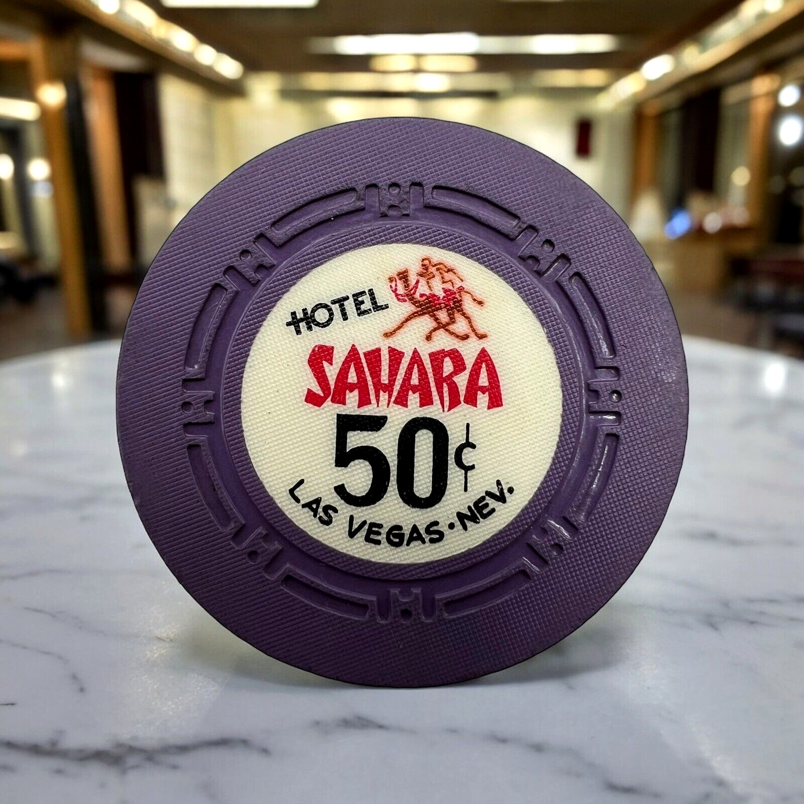 OBSOLETE HOTEL SAHARA Las Vegas Vintage CASINO 50 Cent Purple CHIP Gaming Token