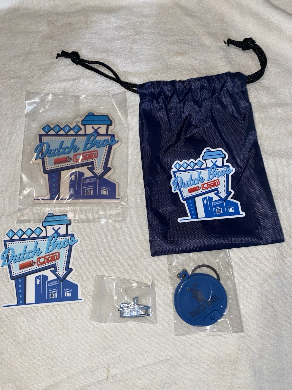 Dutch bros ChainFest LA Chain Holiday House 2025 Swag Bag plus sticker Dutch bros ChainFest LA Chain Holiday House 2025 Swag Bag plus sticker