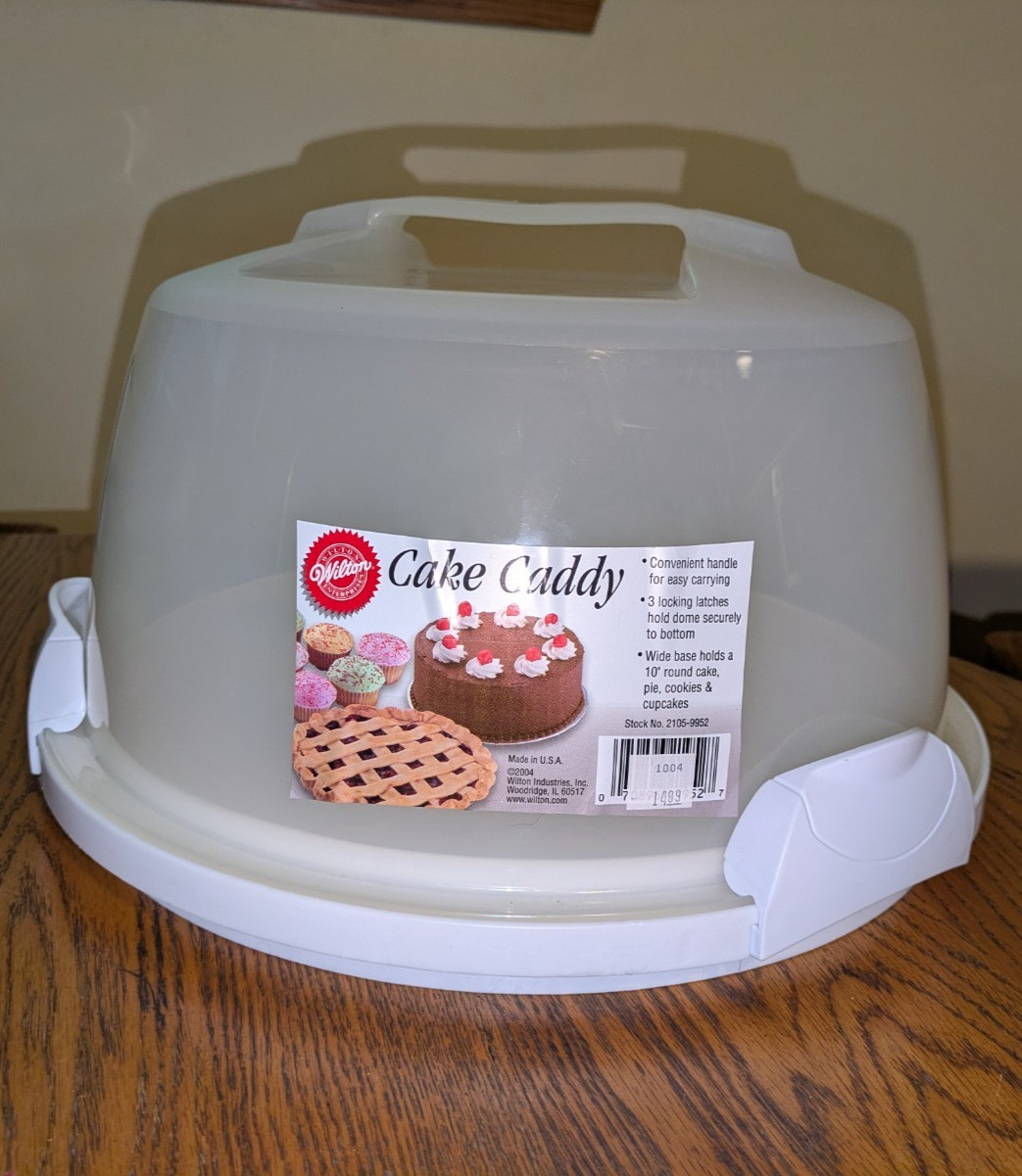 VINTAGE WILTON CAKE CADDY CARRIER HANDLE DOME NEW OLD STOCK PLASTIC 3 LOCK VINTAGE WILTON CAKE CADDY CARRIER HANDLE DOME NEW OLD STOCK PLASTIC 3 LOCK
