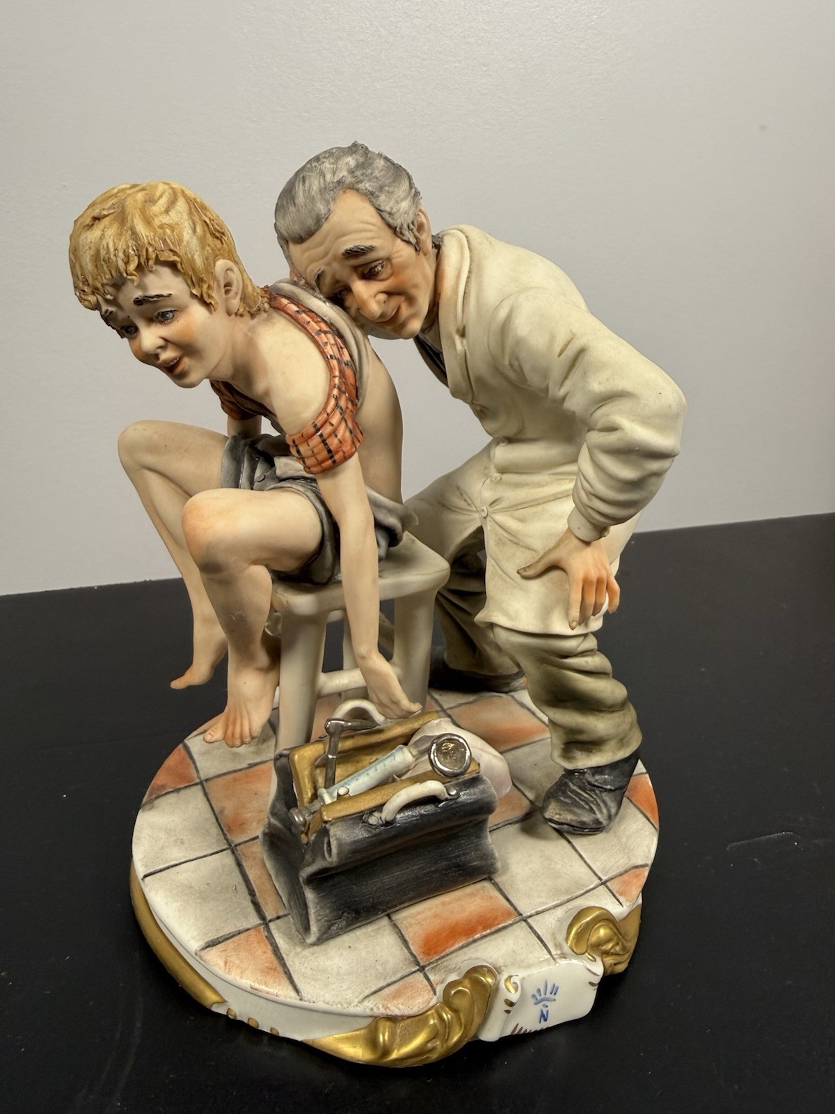 Vintage Italian Porcelain Figurine Doctor Examining Boy Hand Sculpted Italy 358 Vintage Italian Porcelain Figurine Doctor Examining Boy Hand Sculpted Italy 358