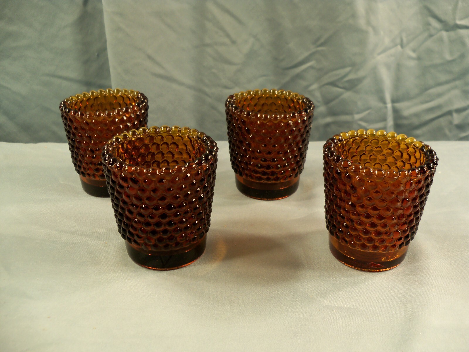 Lot of 4 Amber Glass Hobnail Votive Candle Holders Lot of 4 Amber Glass Hobnail Votive Candle Holders