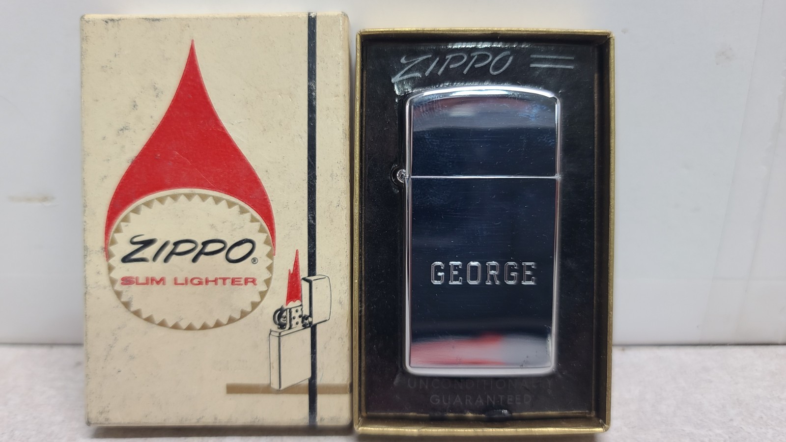 VINTAGE 1973 ZIPPO SLIM LIGHTER "GEORGE" HIGH POLISH CHROME BOX ORIGINAL 