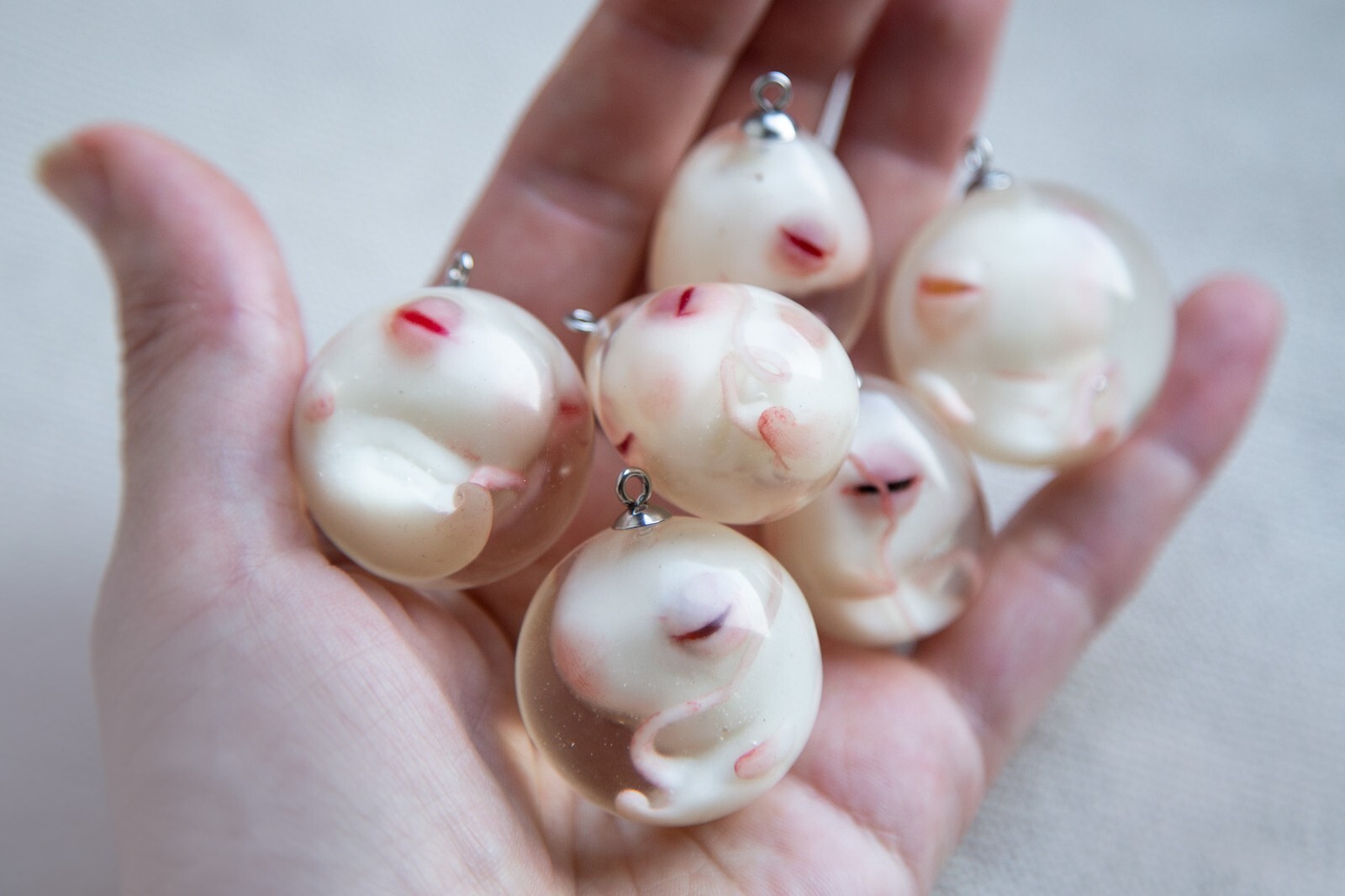 Pendants with embyos (Cthulhu, Axolotl, Dragon), different colors possible Pendants with embyos (Cthulhu, Axolotl, Dragon), different colors possible
