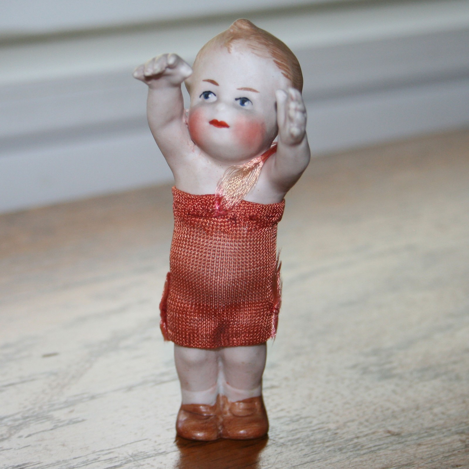 Tiny German Gebrüder Heubach Action Baby - dressed in original outfit