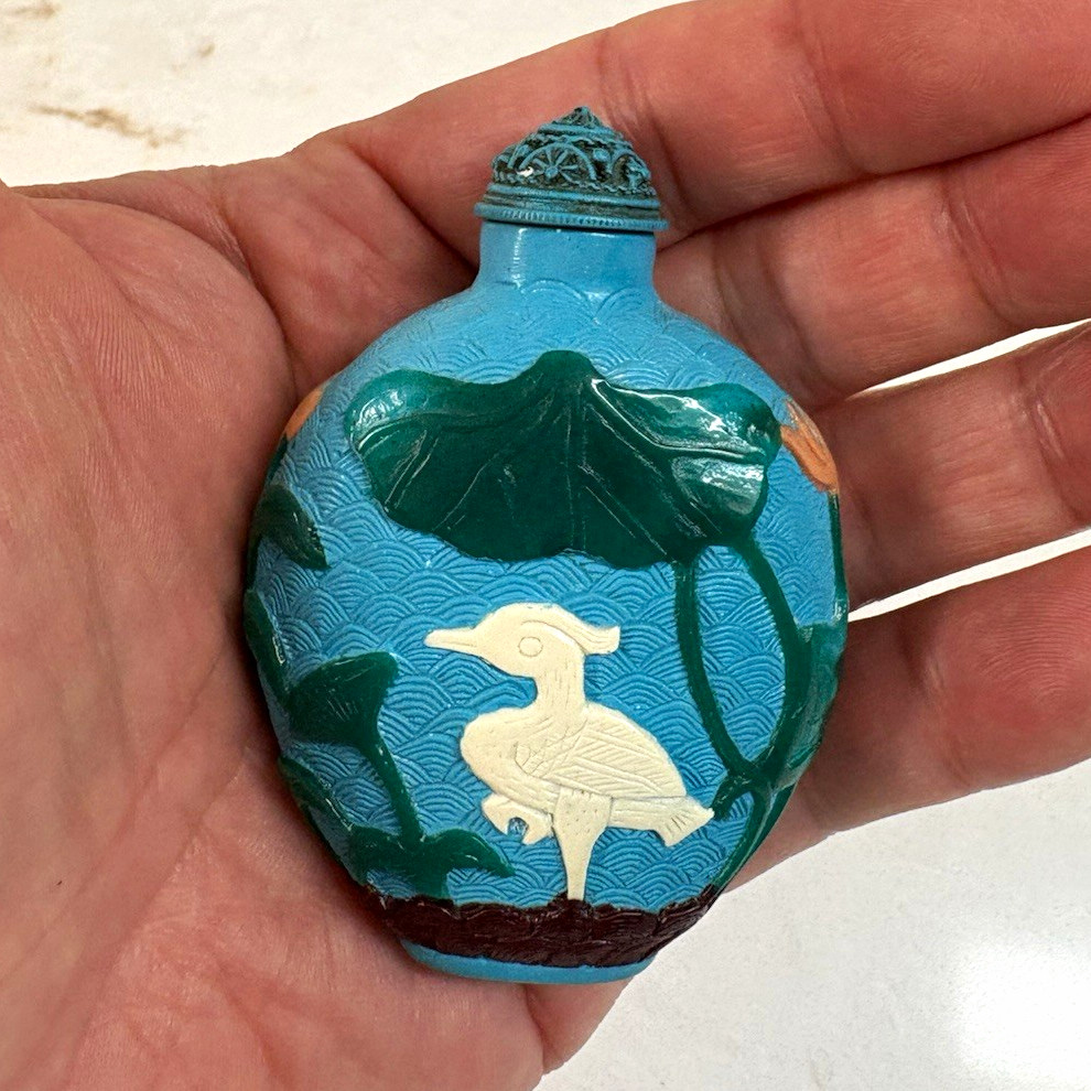 Chinese Peking Overlay Glass Snuff Bottle, Turquoise‑blue ground, multi‑color Chinese Peking Overlay Glass Snuff Bottle, Turquoise‑blue ground, multi‑color