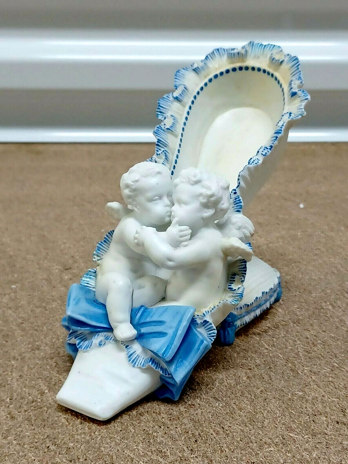 Antique French Vion et Baury Porcelain Figurine, Cherubs on Shoe, 5.5" high. Antique French Vion et Baury Porcelain Figurine, Cherubs on Shoe, 5.5" high.