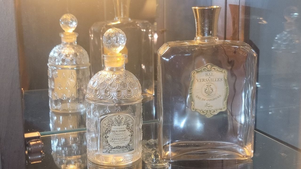 Pair of vintage cologne bottles: Guerlain "Bee bottle" & Bal Versailles, Paris Pair of vintage cologne bottles: Guerlain "Bee bottle" & Bal Versailles, Paris