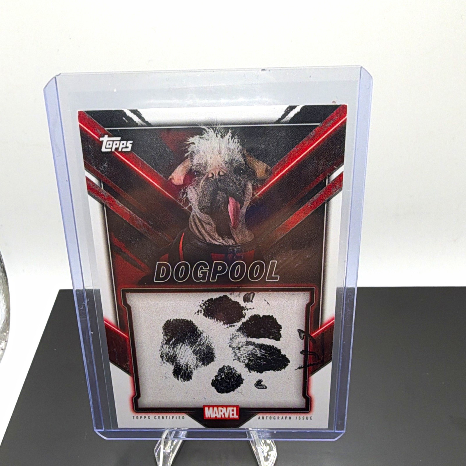 2025 Topps Chrome Deadpool Pawtograph featuring Peggy the Dog as Dogpool.