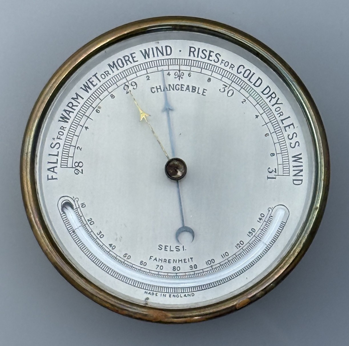 Vintage Selsi English brass-cased aneroid barometer with curved Fahrenheit therm Vintage Selsi English brass-cased aneroid barometer with curved Fahrenheit therm