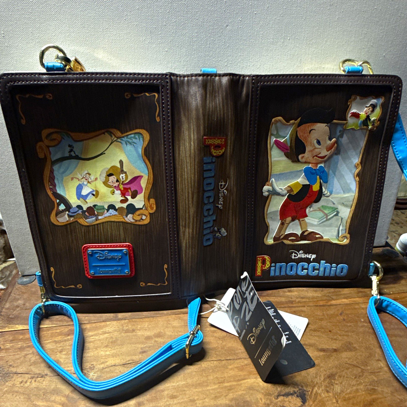 Loungefly Disney Pinocchio Classic Books Convertible Crossbody Bag WDTB2650 NWT Loungefly Disney Pinocchio Classic Books Convertible Crossbody Bag WDTB2650 NWT