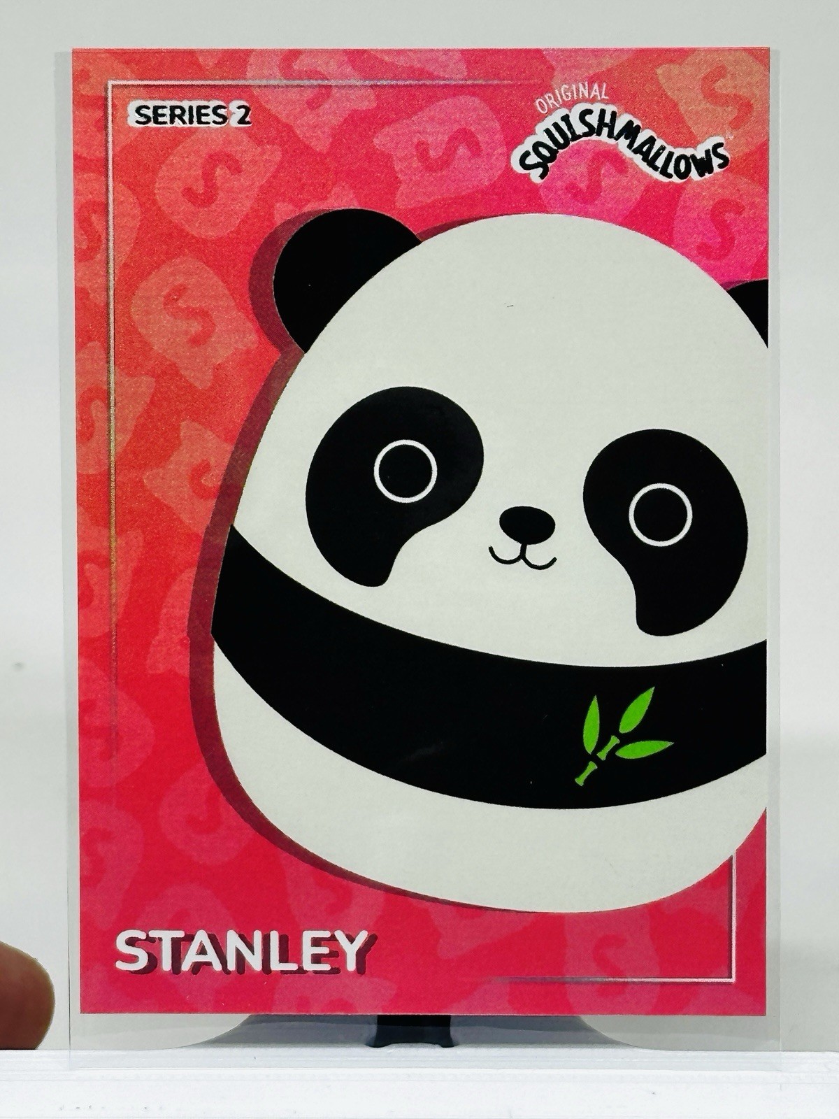 2025 Panini Squishmallows No. 84 Stanley Pink $ Holo #/349 Series 2 - NM/M 2025 Panini Squishmallows No. 84 Stanley Pink $ Holo #/349 Series 2 - NM/M