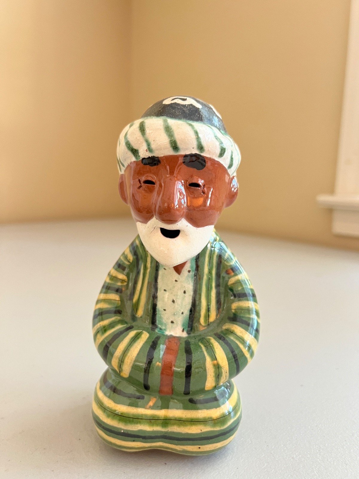 hand painted elderly gentleman from UZBEKISTAN. A  babai