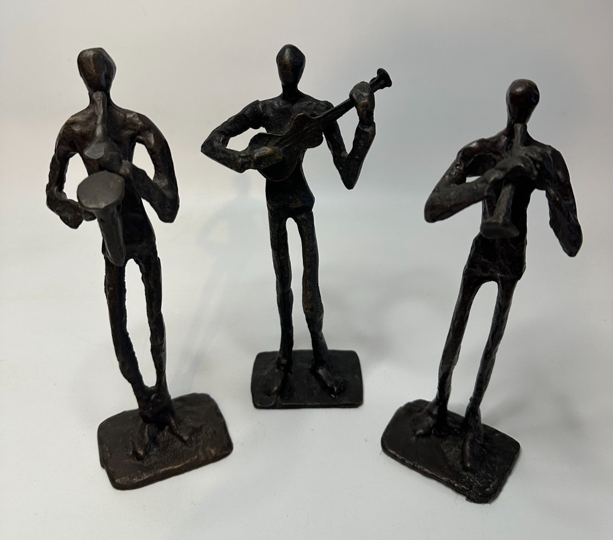 set of 3 mcm solid bronze guitar/sax/horn jazz musician sculptures 7.5" set of 3 mcm solid bronze guitar/sax/horn jazz musician sculptures 7.5"