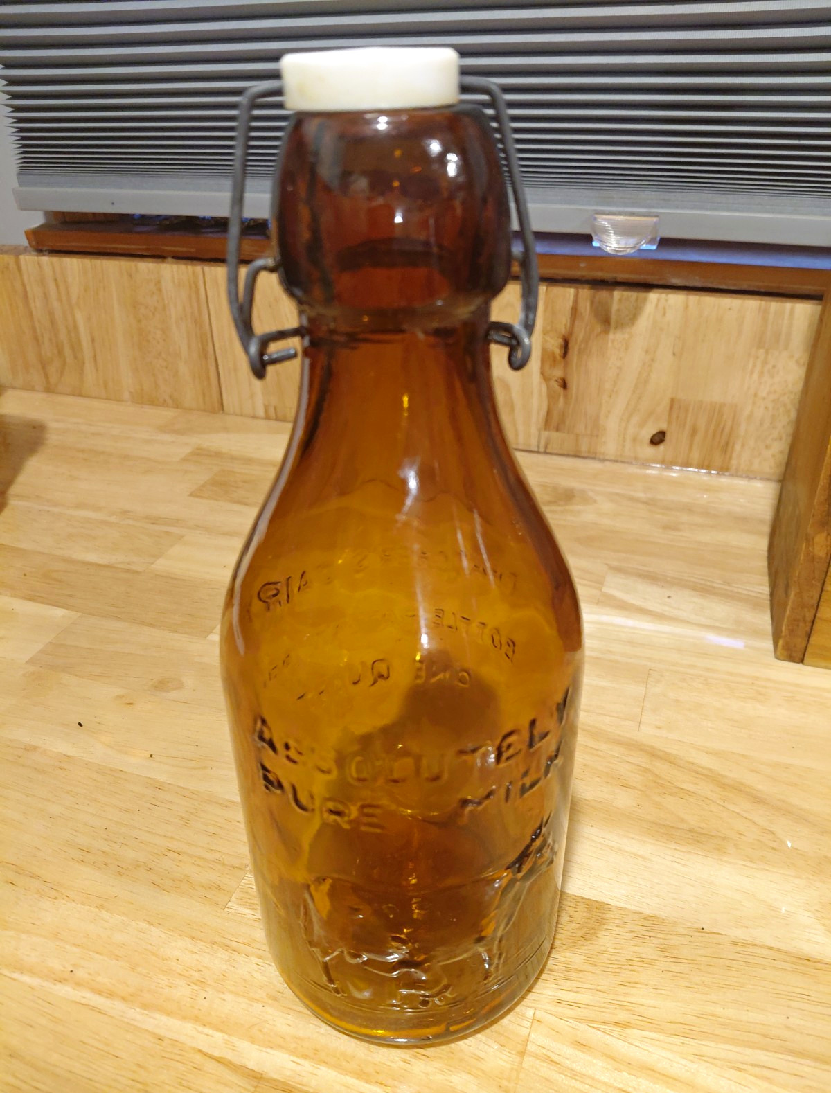 Vintage Amber Milk Bottle - Thatcher's Dairy, White cap with Bail Vintage Amber Milk Bottle - Thatcher's Dairy, White cap with Bail