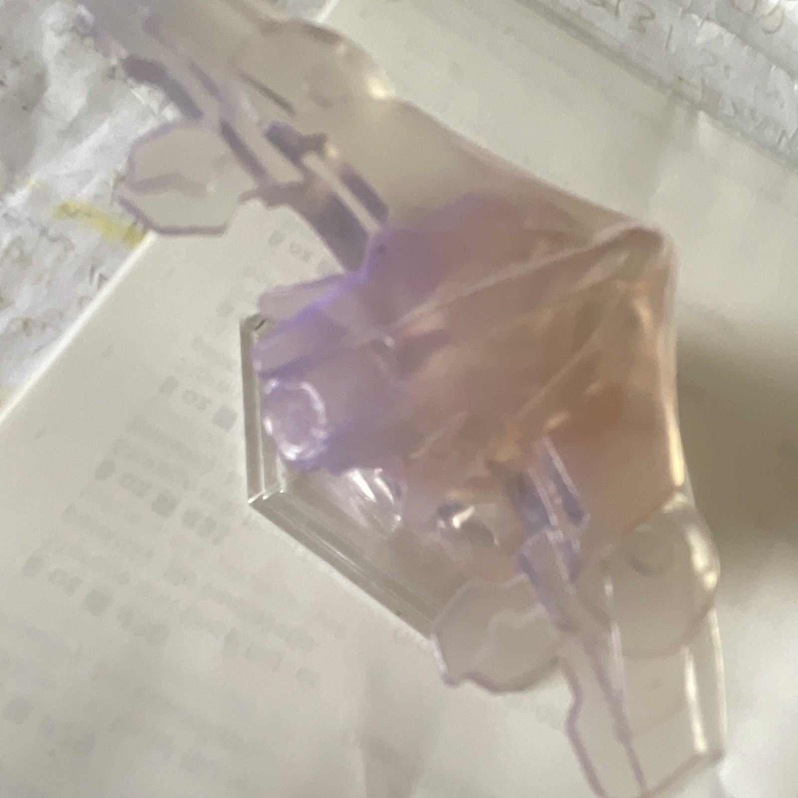 Translucent Purple & Clear Plastic Aircraft Figurine on Clear Hex Base Translucent Purple & Clear Plastic Aircraft Figurine on Clear Hex Base