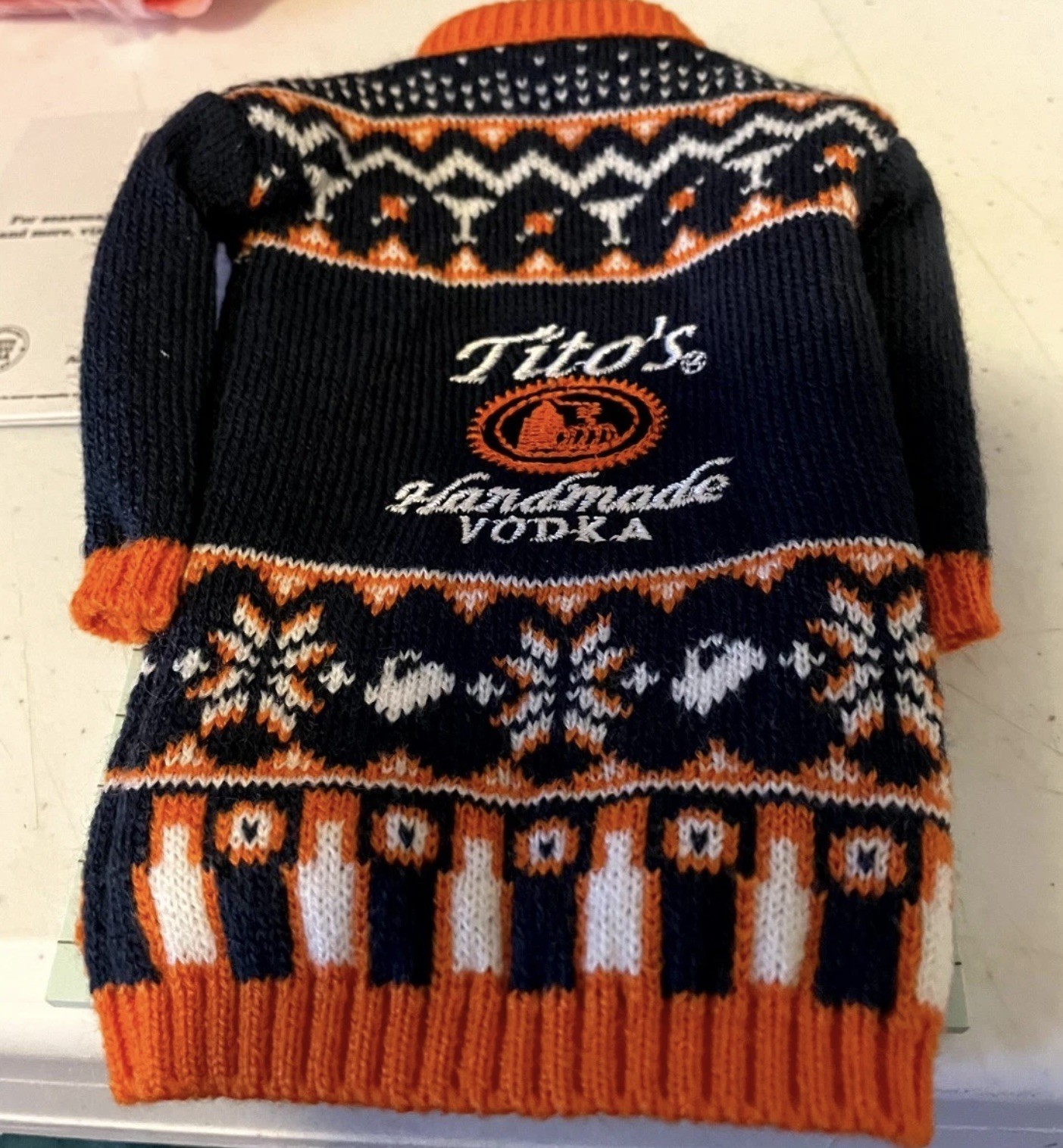 Tito’s Vodka Bottle Mini Sweater Christmas Holiday 2025 Black & Orange lot of 4 Tito’s Vodka Bottle Mini Sweater Christmas Holiday 2025 Black & Orange lot of 4