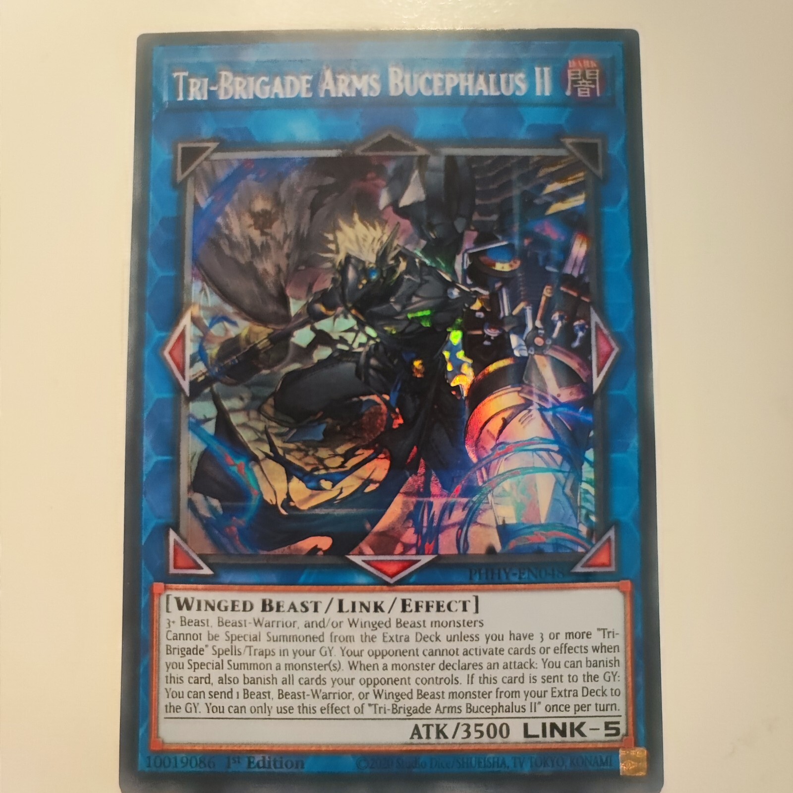 Yugioh Tri-Brigade Arms "Bucephalus II PHHY Super Rare 1st Edition NM. En Yugioh Tri-Brigade Arms "Bucephalus II PHHY Super Rare 1st Edition NM. En