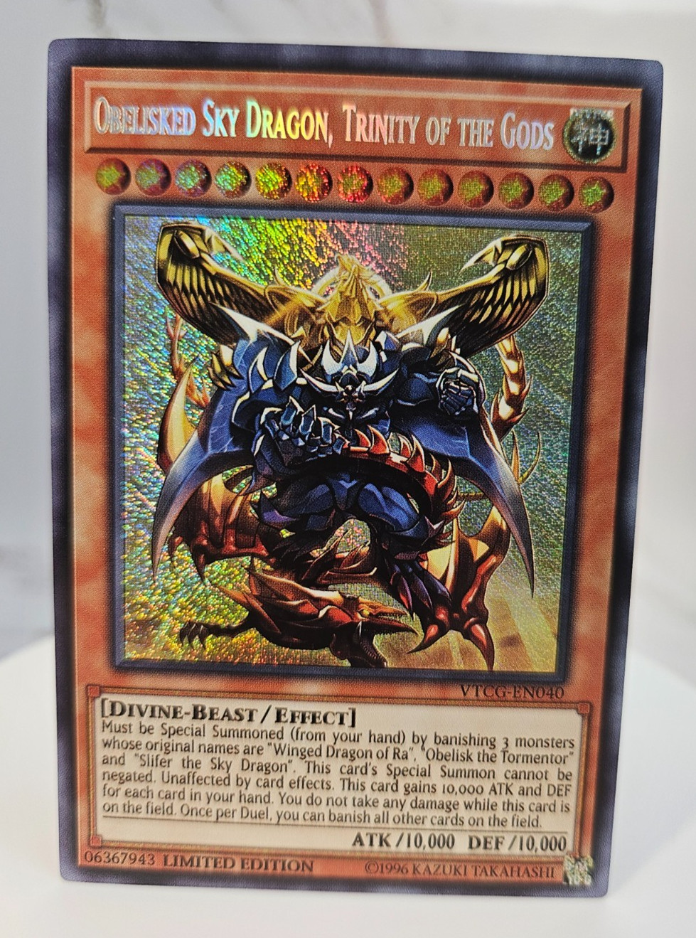 Obelisked Sky Dragon Trinity of the Gods - Secret - (Obelisk/Slifer/Ra/Holactie) Obelisked Sky Dragon Trinity of the Gods - Secret - (Obelisk/Slifer/Ra/Holactie)