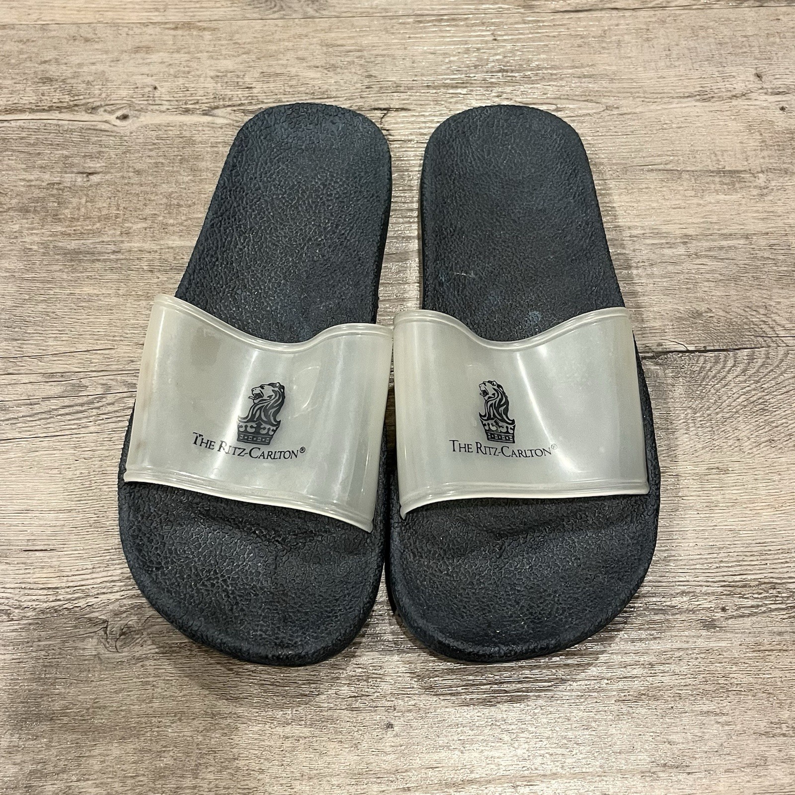 The Ritz Carlton Hotel XL Rubber Slides - Clear and Black - Extra Large The Ritz Carlton Hotel XL Rubber Slides - Clear and Black - Extra Large