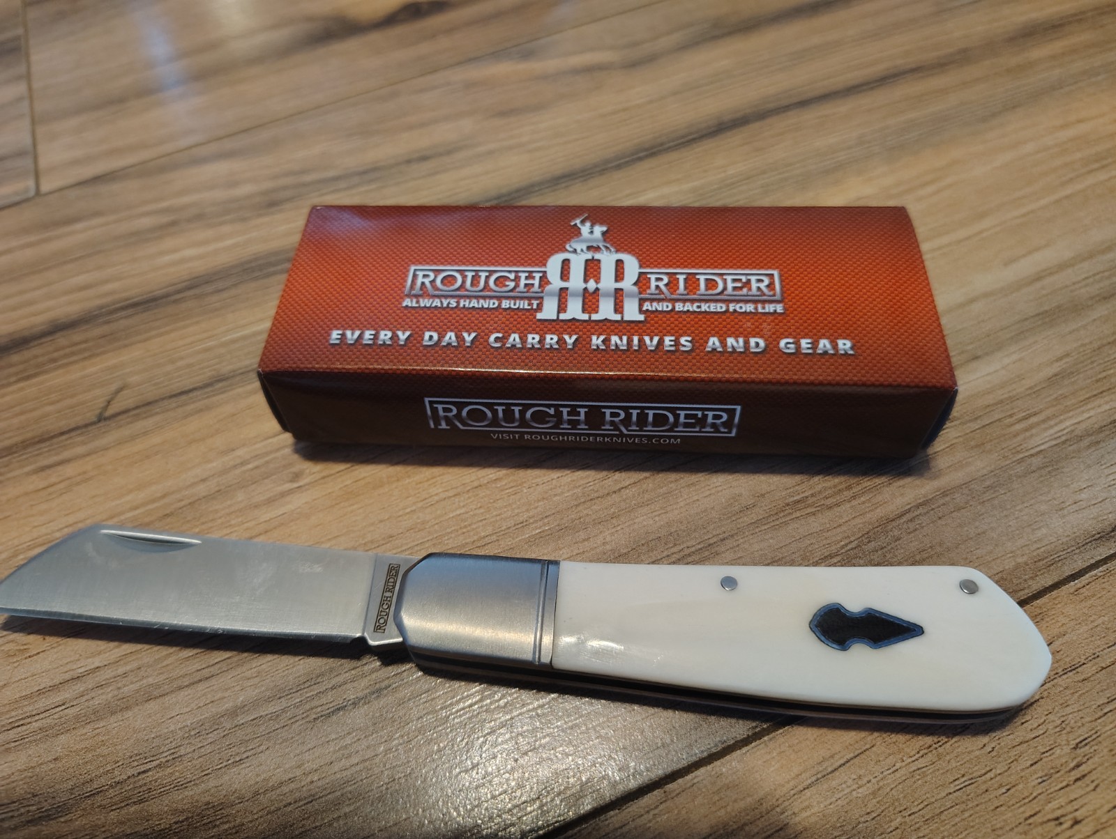 Brand new rough rider pocket knife white rr2708 Brand new rough rider pocket knife white rr2708
