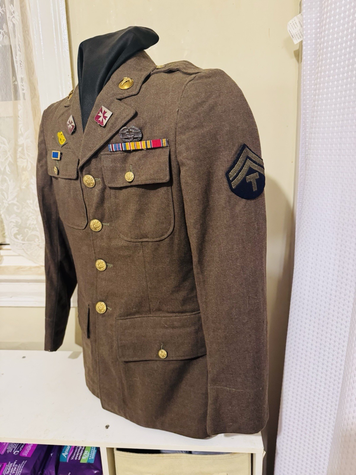 WWII M1942 Spec P.Q.D. 197, EM Wool Service Coat, 12th field Artillery WWII M1942 Spec P.Q.D. 197, EM Wool Service Coat, 12th field Artillery