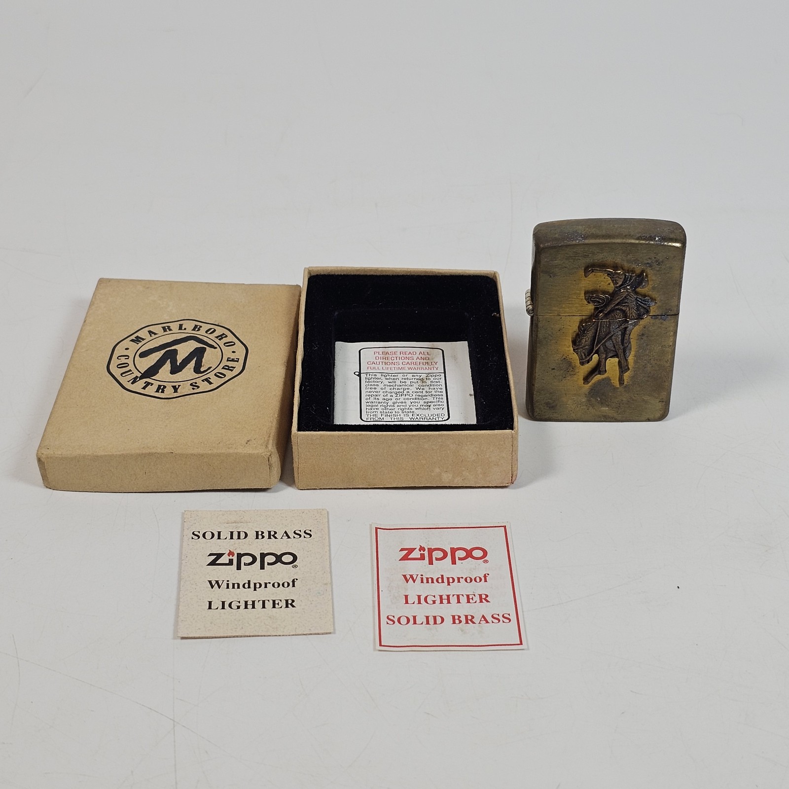 Vintage 1994 Zippo Solid Brass Lighter Marlboro Country Store Rodeo Cowboy w/ Vintage 1994 Zippo Solid Brass Lighter Marlboro Country Store Rodeo Cowboy w/