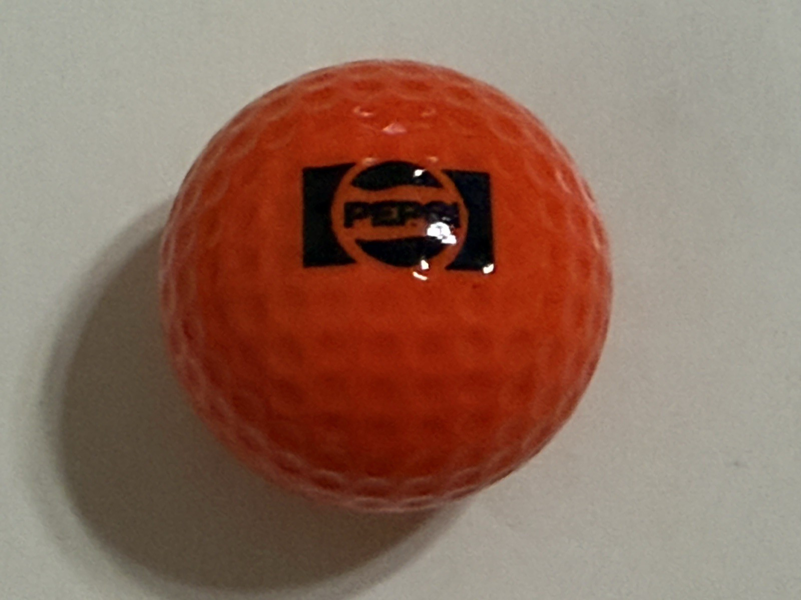 Vintage 1970s - 1980s Pepsi-Cola Pepsi Golf Ball Orange "RAM 3D 4"