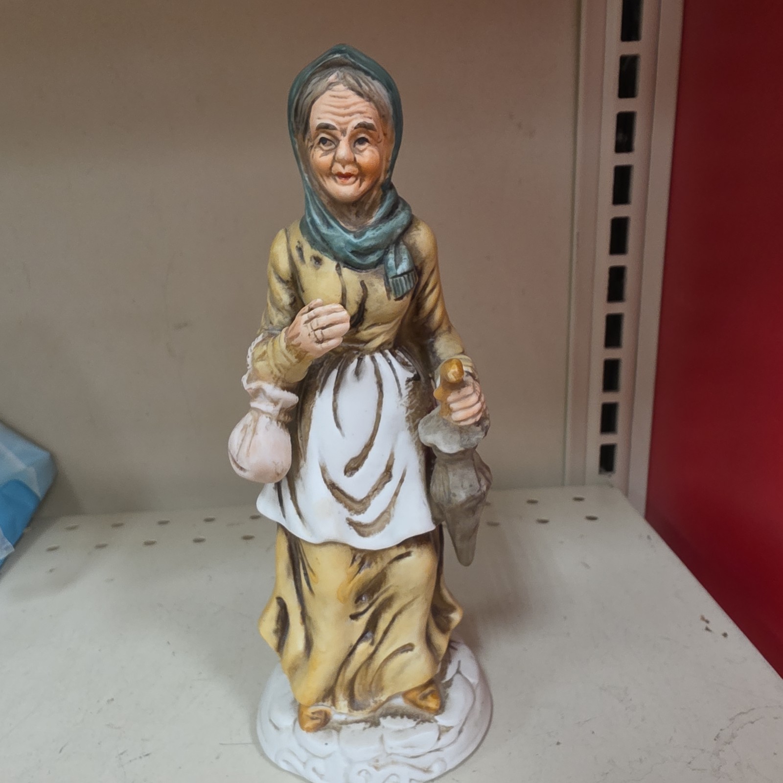 Vintage Porcelain Figurine Old Lady w/ Umbrella, purse, wearing a head scarf Vintage Porcelain Figurine Old Lady w/ Umbrella, purse, wearing a head scarf