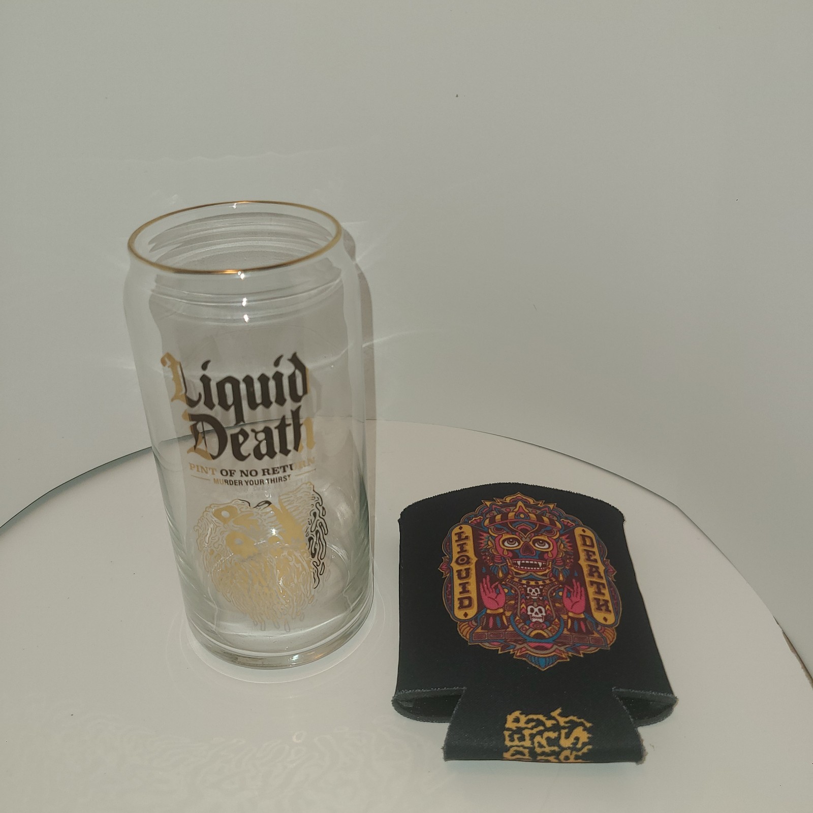 Liquid Death "Pint of No Return" Glass & Can Cooler Koozie Set Liquid Death "Pint of No Return" Glass & Can Cooler Koozie Set