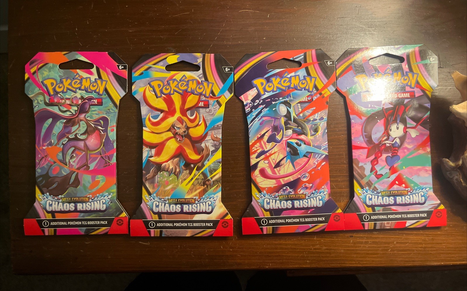 Pokemon TCG Mega Evolution Chaos Rising Sleeved Booster Pack Art Set Lot Of 4 Pokemon TCG Mega Evolution Chaos Rising Sleeved Booster Pack Art Set Lot Of 4