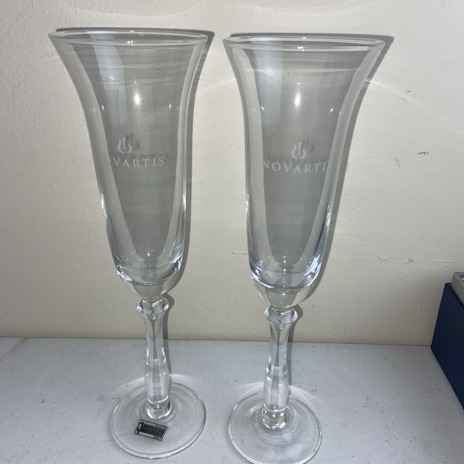 NOVARTIS Champagne Glasses Set Of 2 Clear Crystal 10” Tall Pharmacy Medical NOS NOVARTIS Champagne Glasses Set Of 2 Clear Crystal 10” Tall Pharmacy Medical NOS