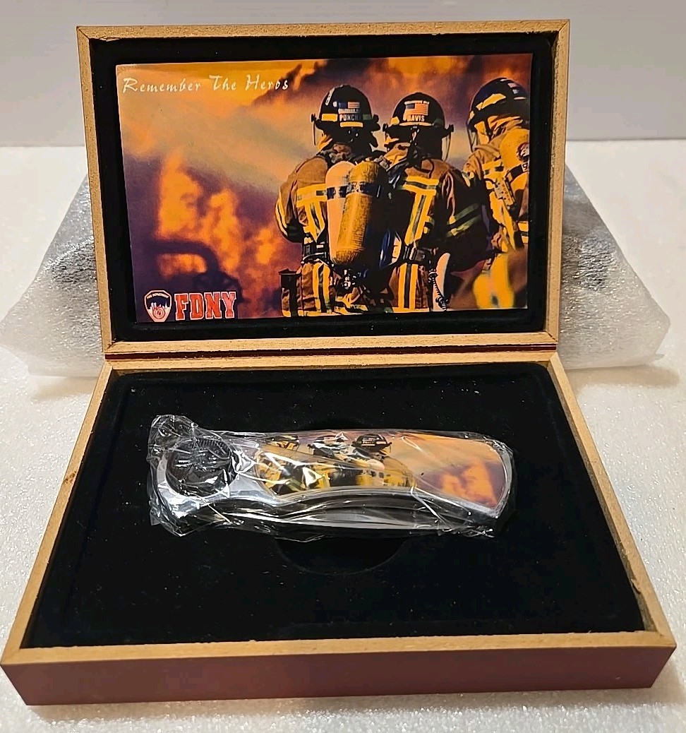 REMEMBER THE HEROES - FDNY COMMEMORATIVE FIREFIGHTER KNIFE NEW IN CASE REMEMBER THE HEROES - FDNY COMMEMORATIVE FIREFIGHTER KNIFE NEW IN CASE