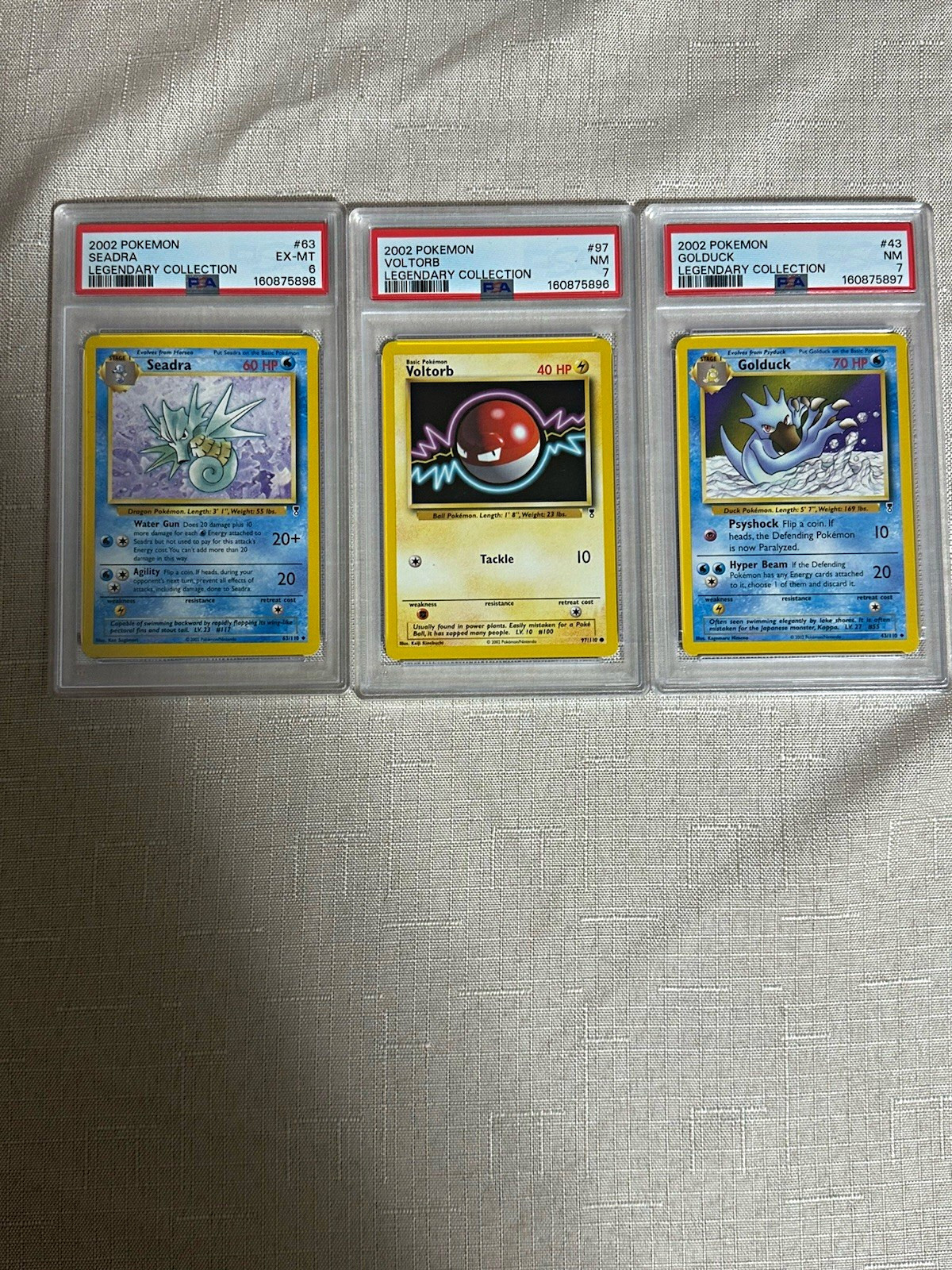 Pokémon Legendary Collection 2002 PSA Graded Lot of 3 Voltorb Seadra Golduck Pokémon Legendary Collection 2002 PSA Graded Lot of 3 Voltorb Seadra Golduck