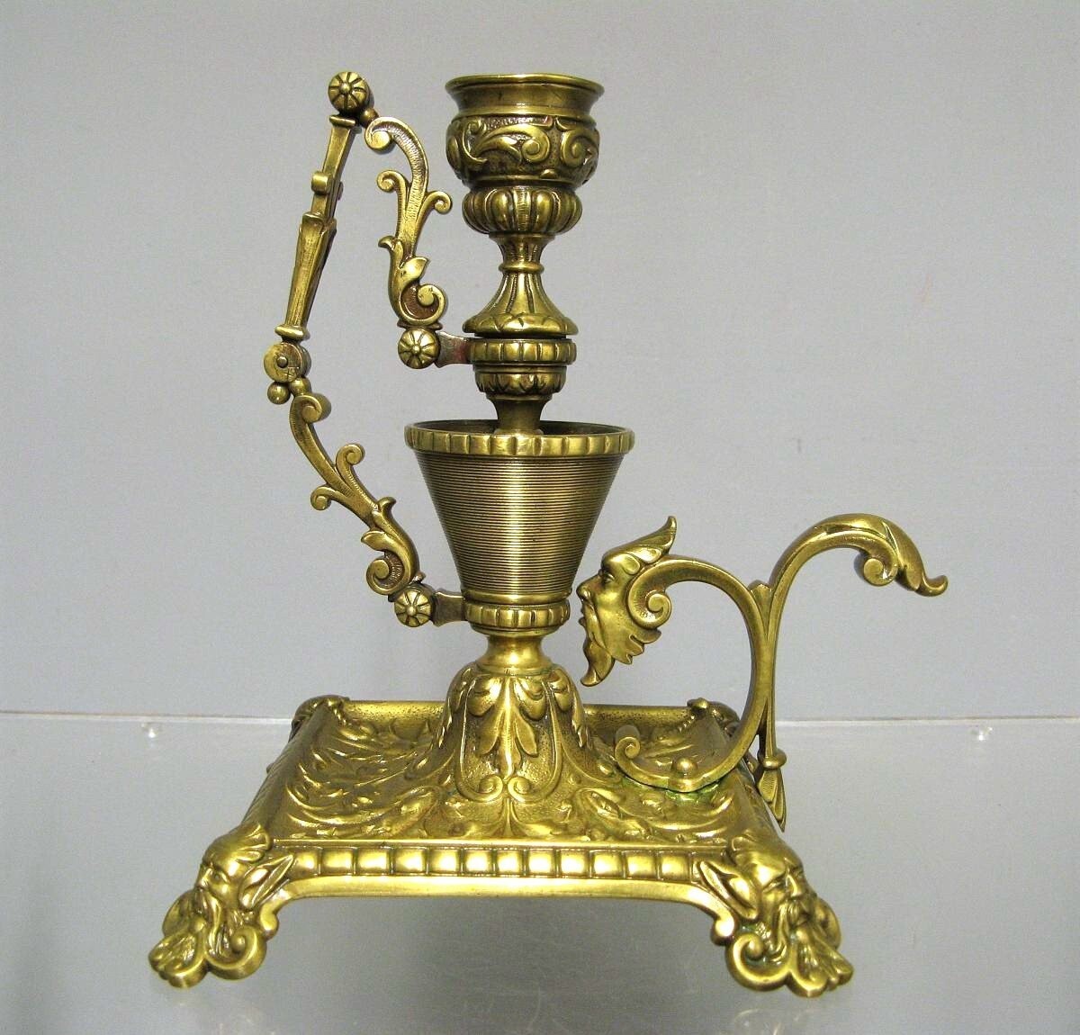 Antique French Pyrogen Handle Candlestick In Gilt Bronze Devil Head Decor 19th Antique French Pyrogen Handle Candlestick In Gilt Bronze Devil Head Decor 19th