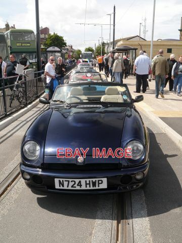 PHOTO  MGS ON BOLD STREET N724 HWP HEADS A LINE UP OF CLASSIC MG SPORTS CARS ON