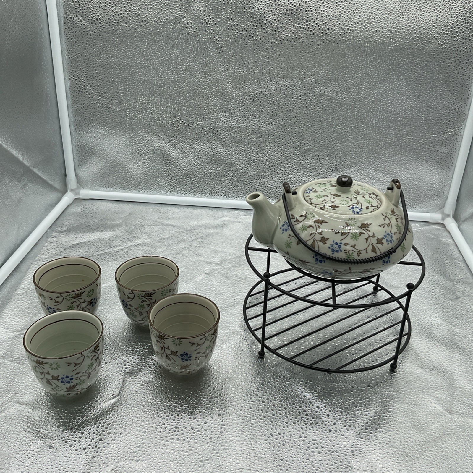 Pier 1 Tomoko Ceramic Floral Asian Tea Pot and Set of 4 Tea Cups with Stand Pier 1 Tomoko Ceramic Floral Asian Tea Pot and Set of 4 Tea Cups with Stand