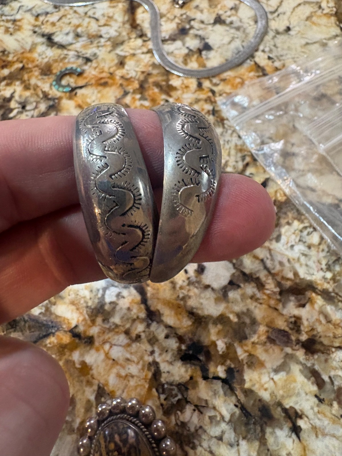 Southwestern (Navajo style) hand-stamped sterling silver half-hoop earrings Southwestern (Navajo style) hand-stamped sterling silver half-hoop earrings
