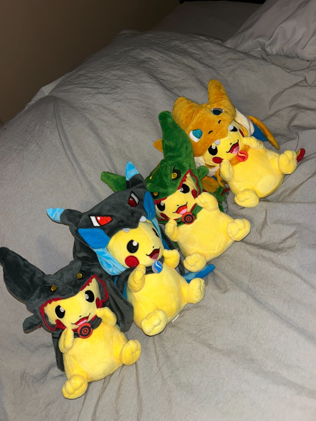 Poncho Pikachu Plush Lot of 4 – Charizard / Mega Charizard X / Rayquaza Variants