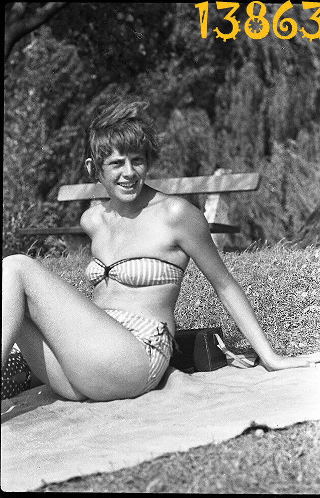 vintage negative sexy girl sunbathing in striped bikini, swimsuit, legs 1960’s 
