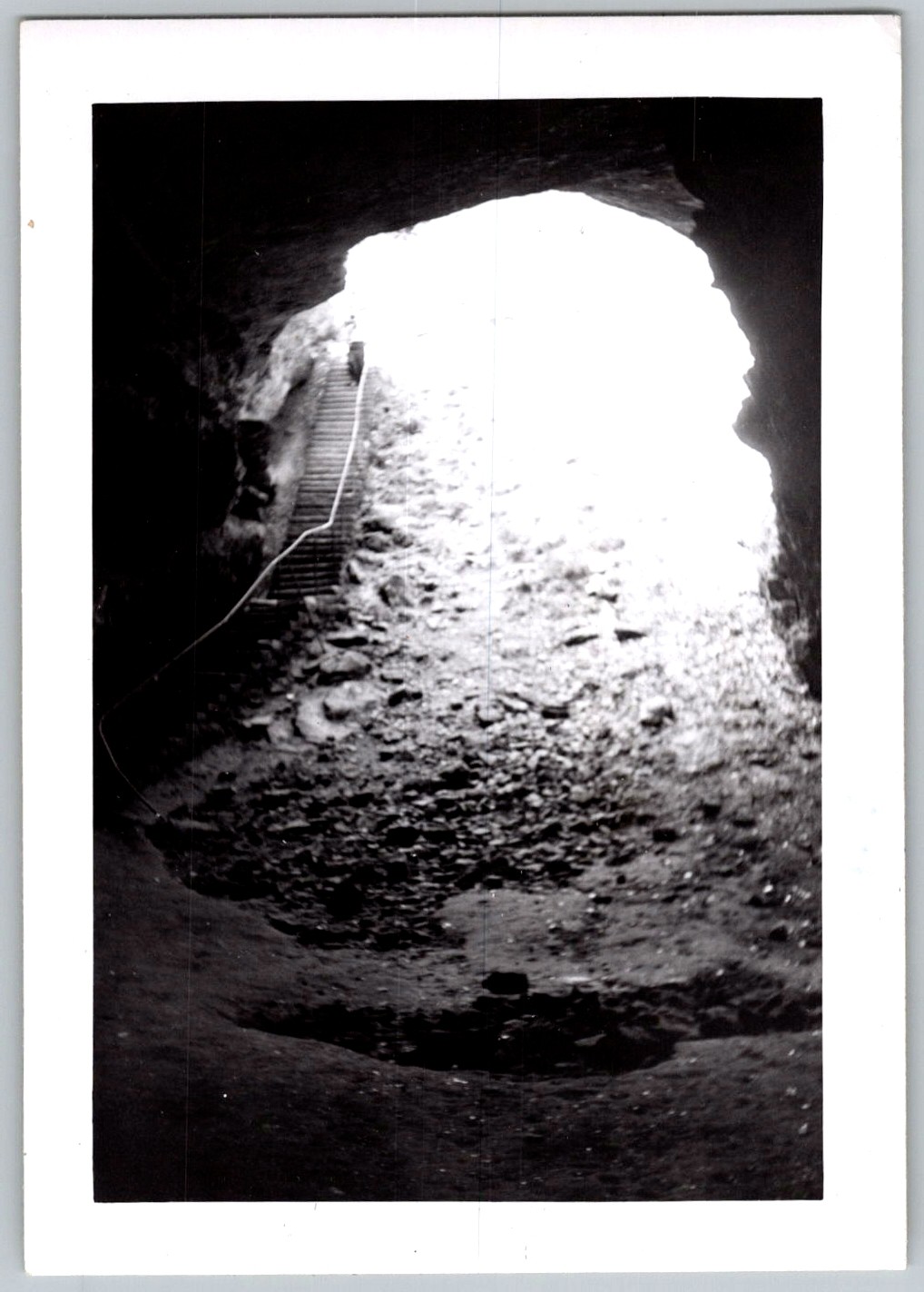 Vtg B&W Snapshot Interior View Of Large Cave With Wooden Stairs & Light 1950s Vtg B&W Snapshot Interior View Of Large Cave With Wooden Stairs & Light 1950s