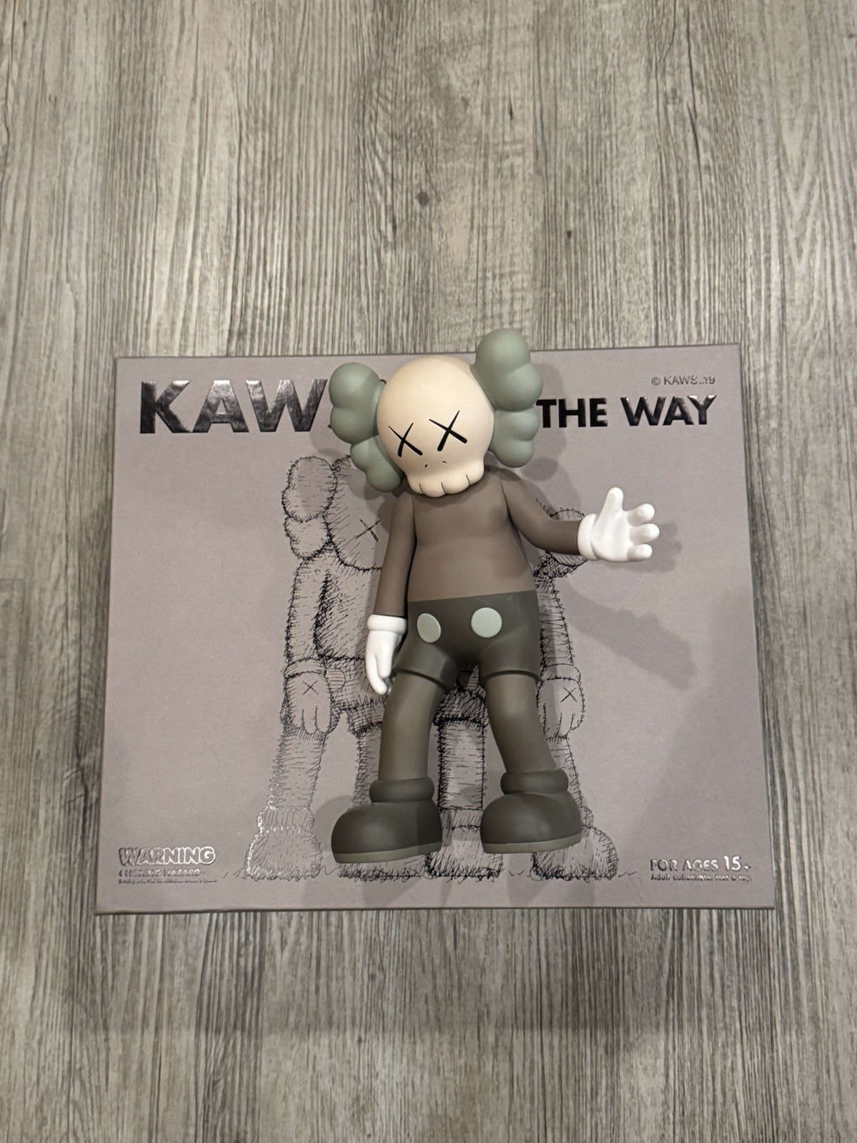 KAWS ALONG THE WAY VINYL FIGURE BROWN OPEN EDITION 2019 KAWS ALONG THE WAY VINYL FIGURE BROWN OPEN EDITION 2019