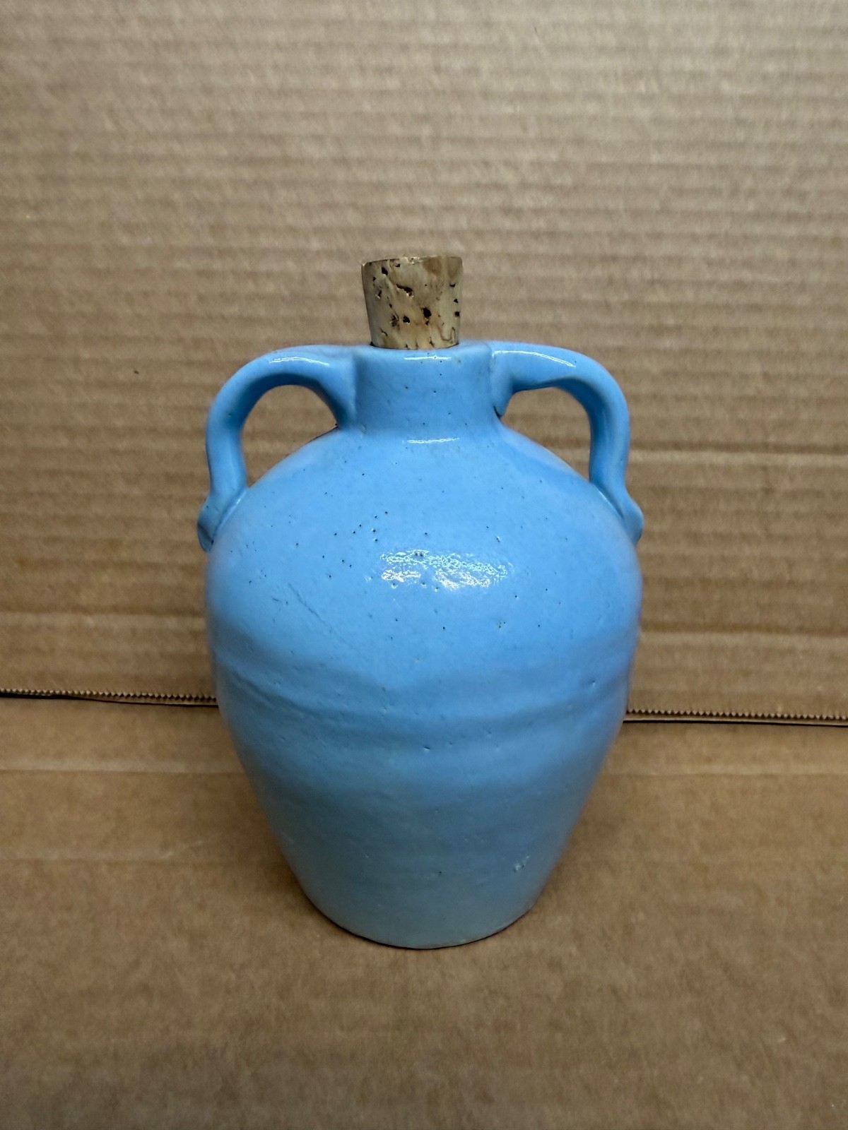 Vintage 5’’ glossy light blue stoneware mini jug with a double-handled & Cork Vintage 5’’ glossy light blue stoneware mini jug with a double-handled & Cork