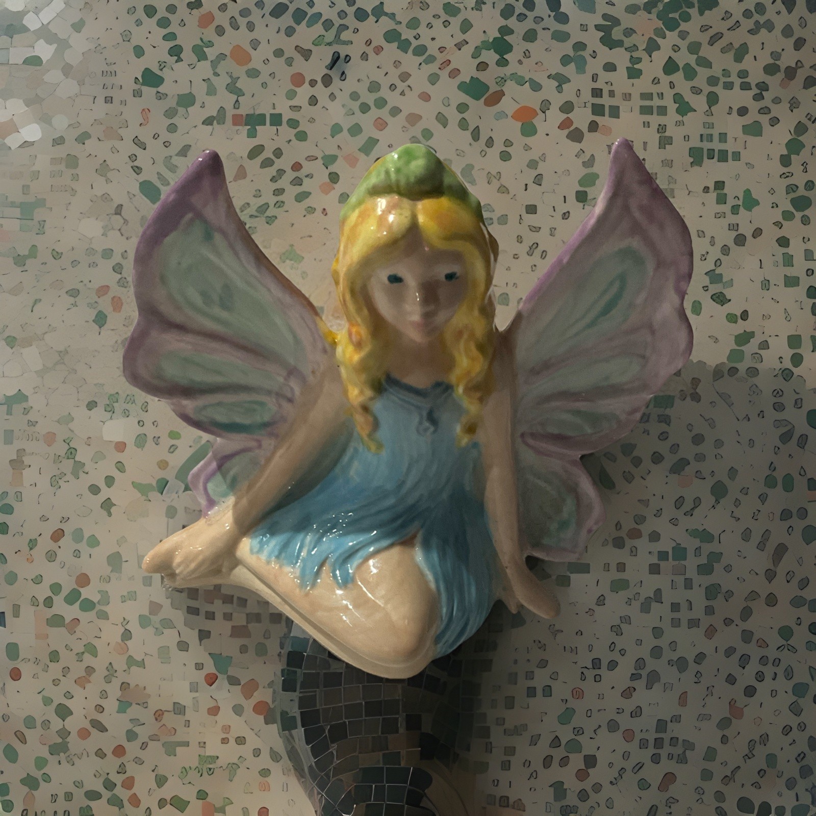 Ceramic Seated Winged Fairy Figurine, Blue Dress with Purple Wings Ceramic Seated Winged Fairy Figurine, Blue Dress with Purple Wings