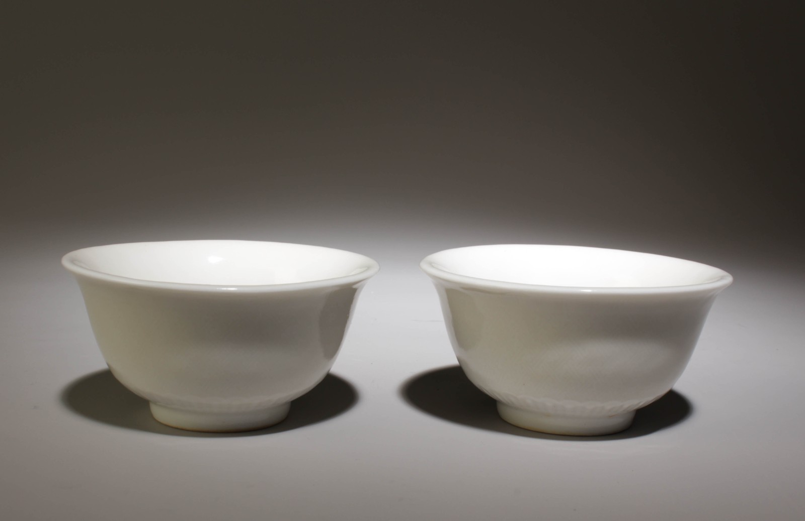 A Pair of White Glazed Cups. "YongLe" Mark at Base. A Pair of White Glazed Cups. "YongLe" Mark at Base.
