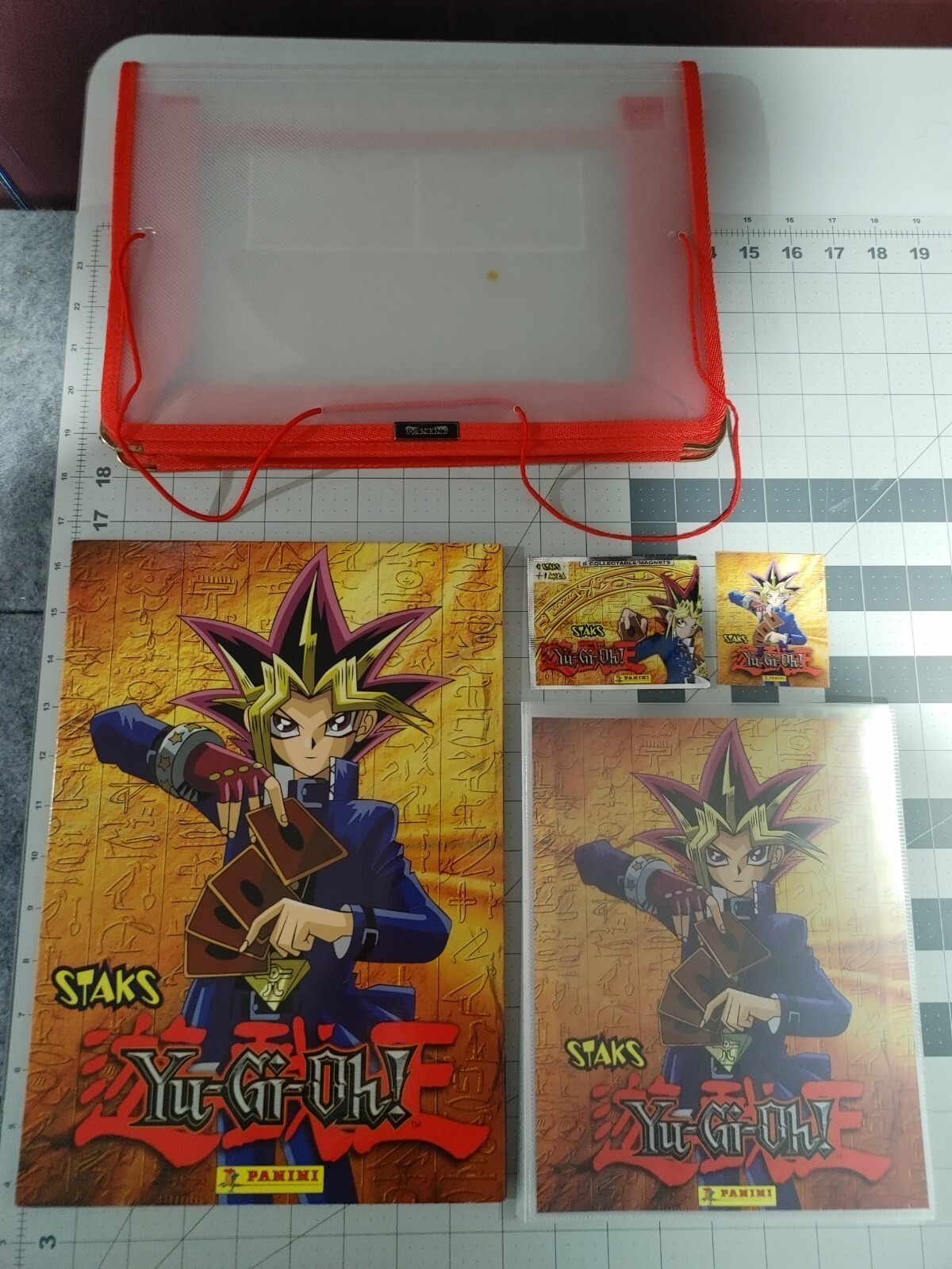 INCOMPLETE Yu-Gi-Oh Panini Staks Lot. Includes ALBUM, BOARD, STAKS AND BINDER.