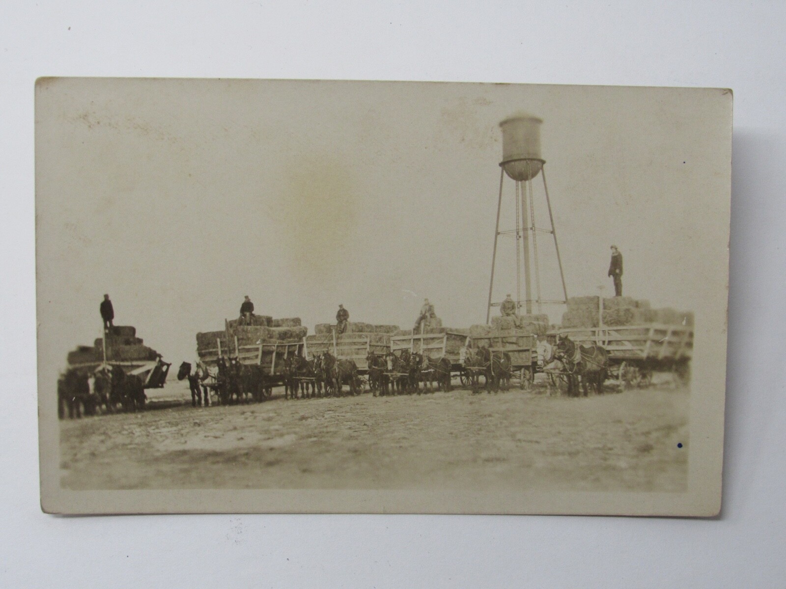 Spearfish SD Water Tower Hay Wagons Farmers Early Settlers c1915 RPPC Postcard Spearfish SD Water Tower Hay Wagons Farmers Early Settlers c1915 RPPC Postcard