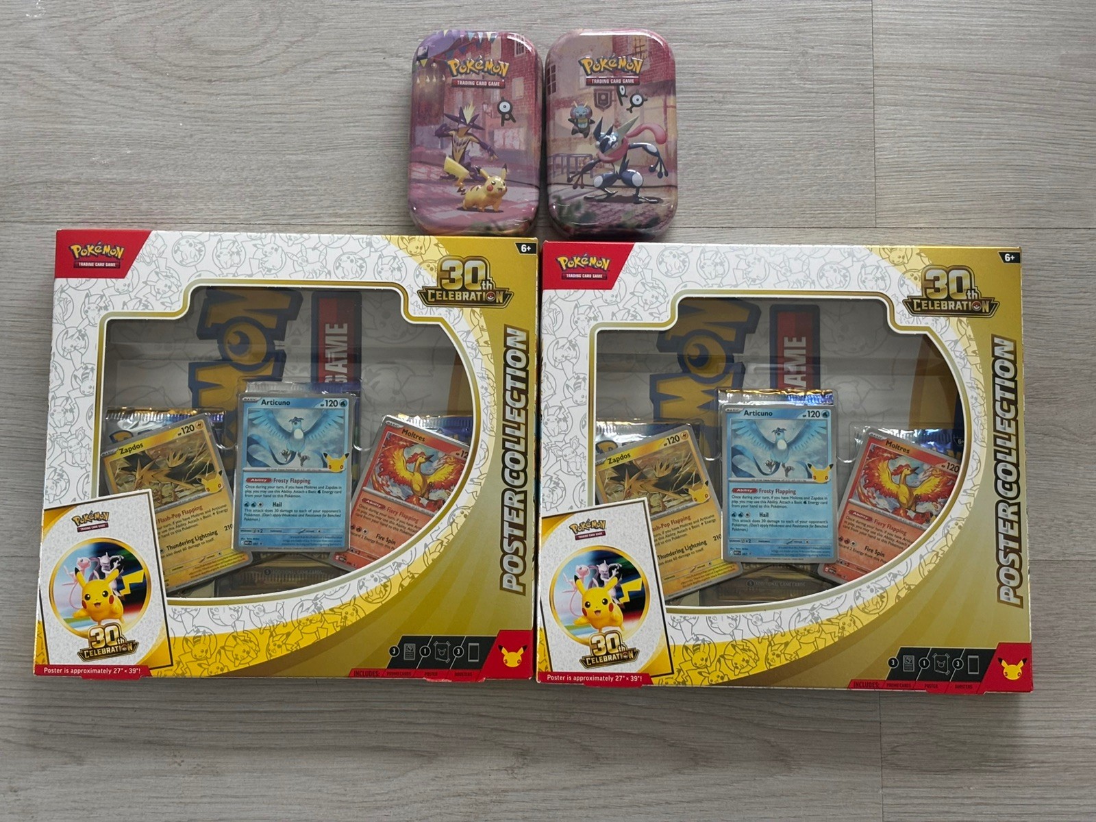 Pokémon 30th celebrations Poster Collection + 2 30th Tins - New & Sealed Pokémon 30th celebrations Poster Collection + 2 30th Tins - New & Sealed
