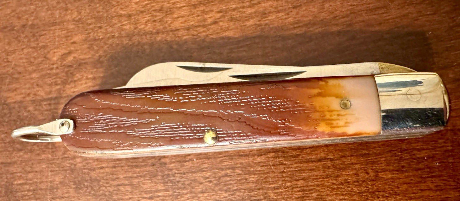 Camillus NY, USA Hawkbill Electrician Pocket Knife 2 Blade Brown Handle Bail Camillus NY, USA Hawkbill Electrician Pocket Knife 2 Blade Brown Handle Bail